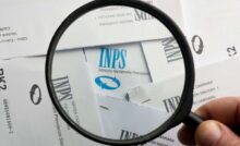 una lente di ingrandimento con la scritta Inps