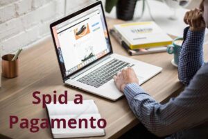 un computer e la scritta spid a pagamento